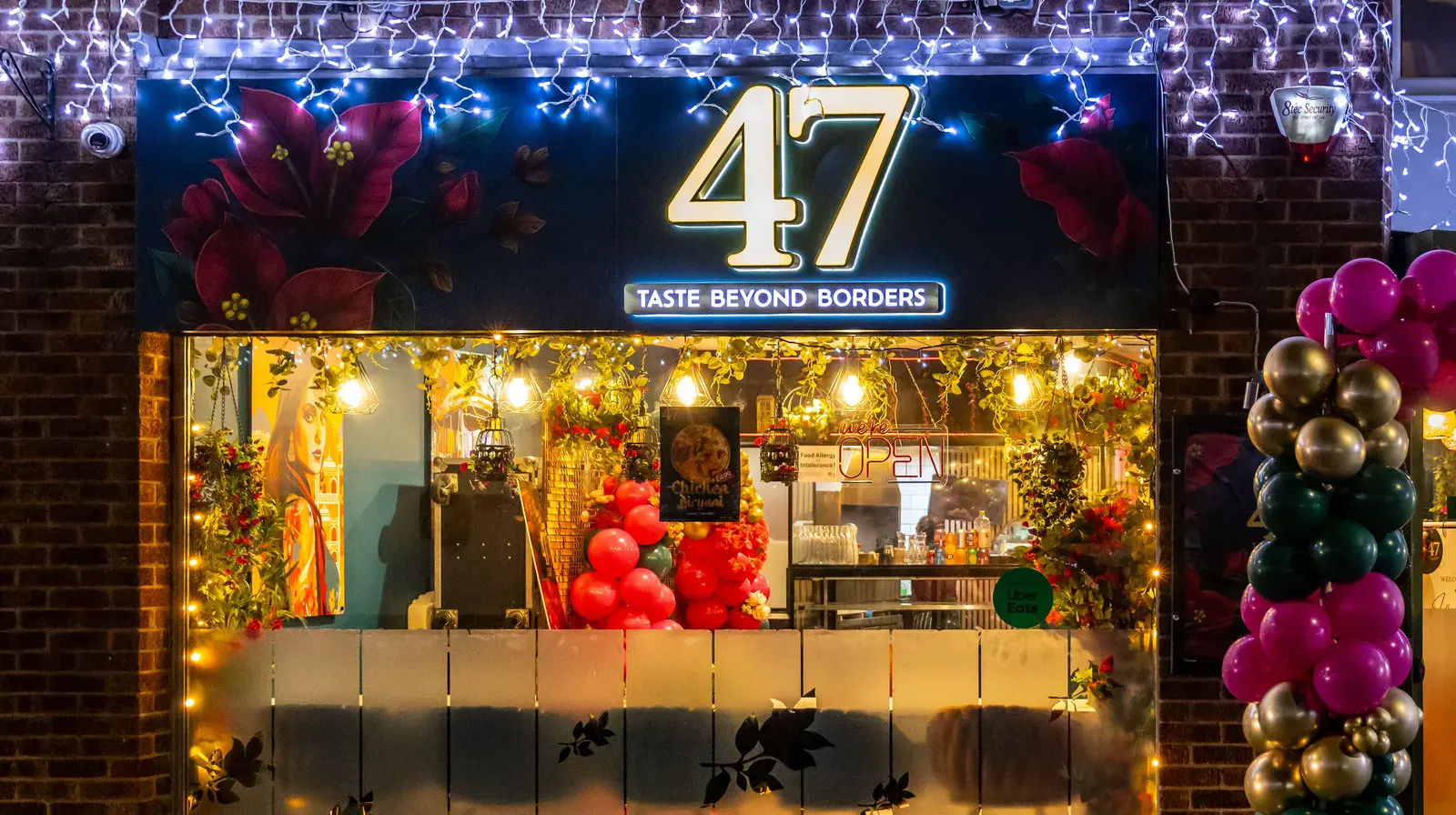 The lit 47 restaurant frontage at night on Leicester Road, Wigston